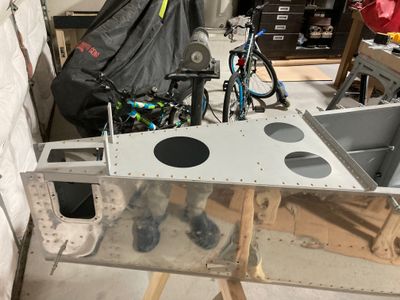 Riveting the aft deck and the rudder brace