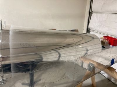 Riveting the aft fuselage skins