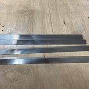 Cut aluminum angles.