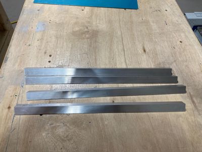 Cut aluminum angles.