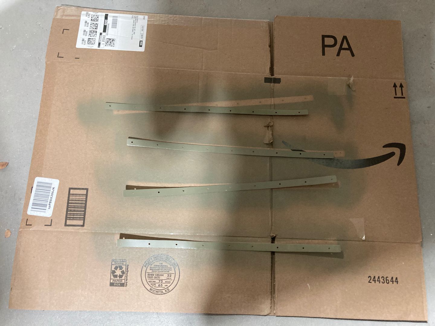 The aluminum backing strips.