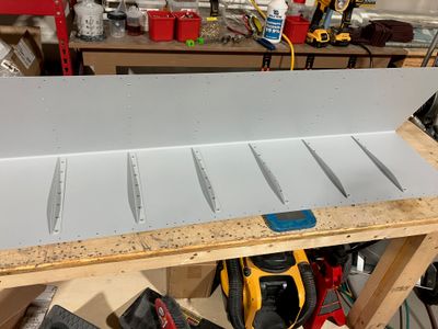 Backriveting the stiffeners.