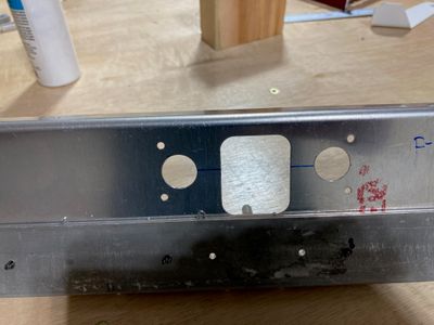 Holes for the snap bushings.