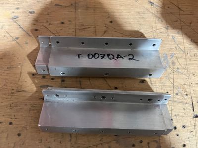 Deburred tank brackets.