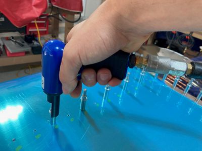 Deburring the horizontal stabilizer parts