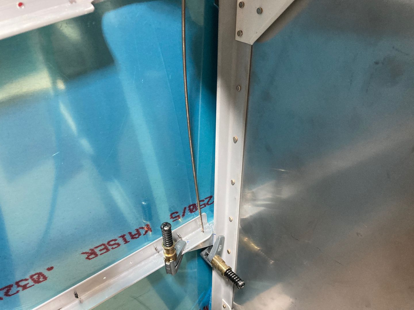 Drilling the angle clip.