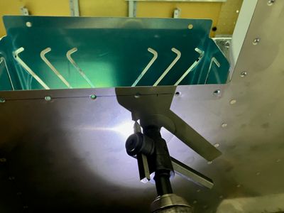 Drilling the hole with a fly cutter.