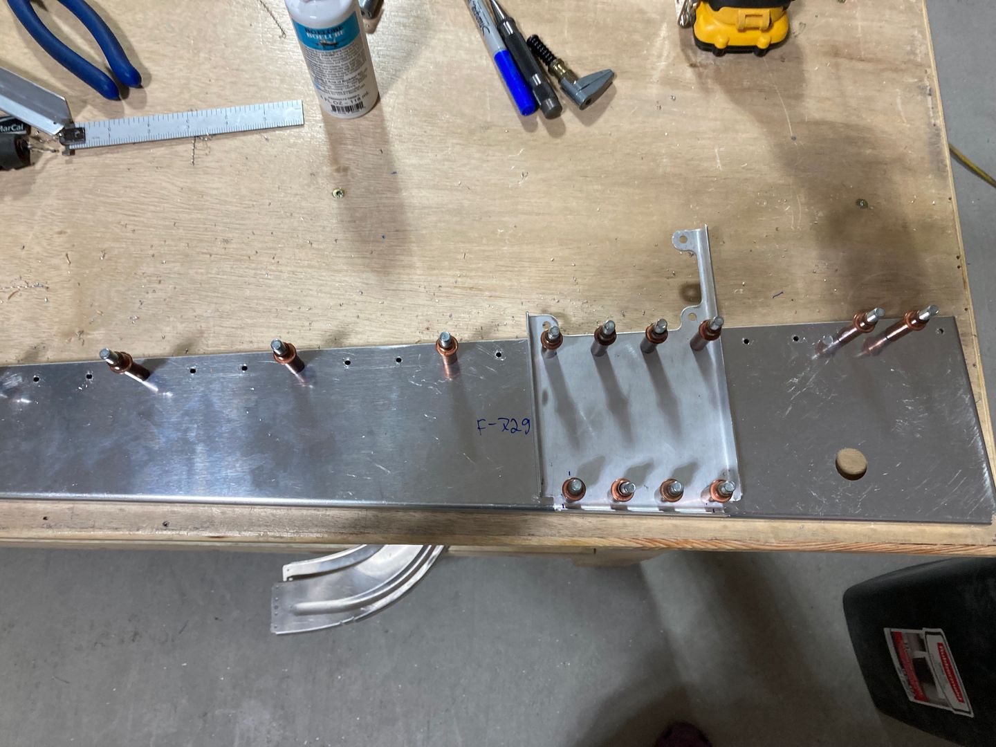 Drilling the autopilot servo bracket.