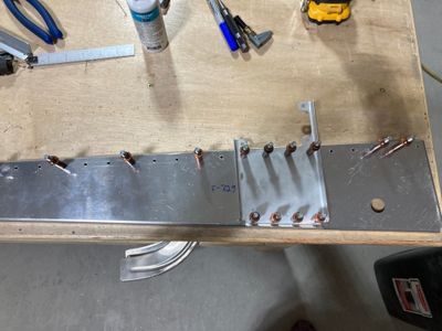 Drilling the autopilot servo bracket.