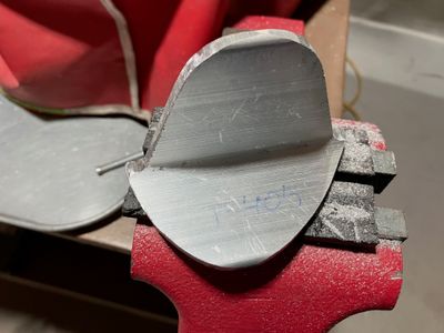 Filing the angle to fit.
