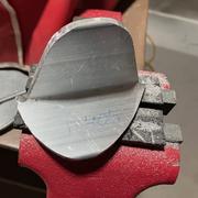 Filing the angle to fit.
