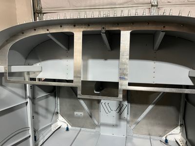 Panel frame attached with screws