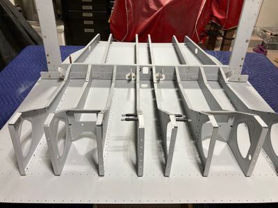 Riveting ribs to the bulkhead