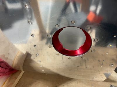 Riveting the fuel flange and the fuel vent