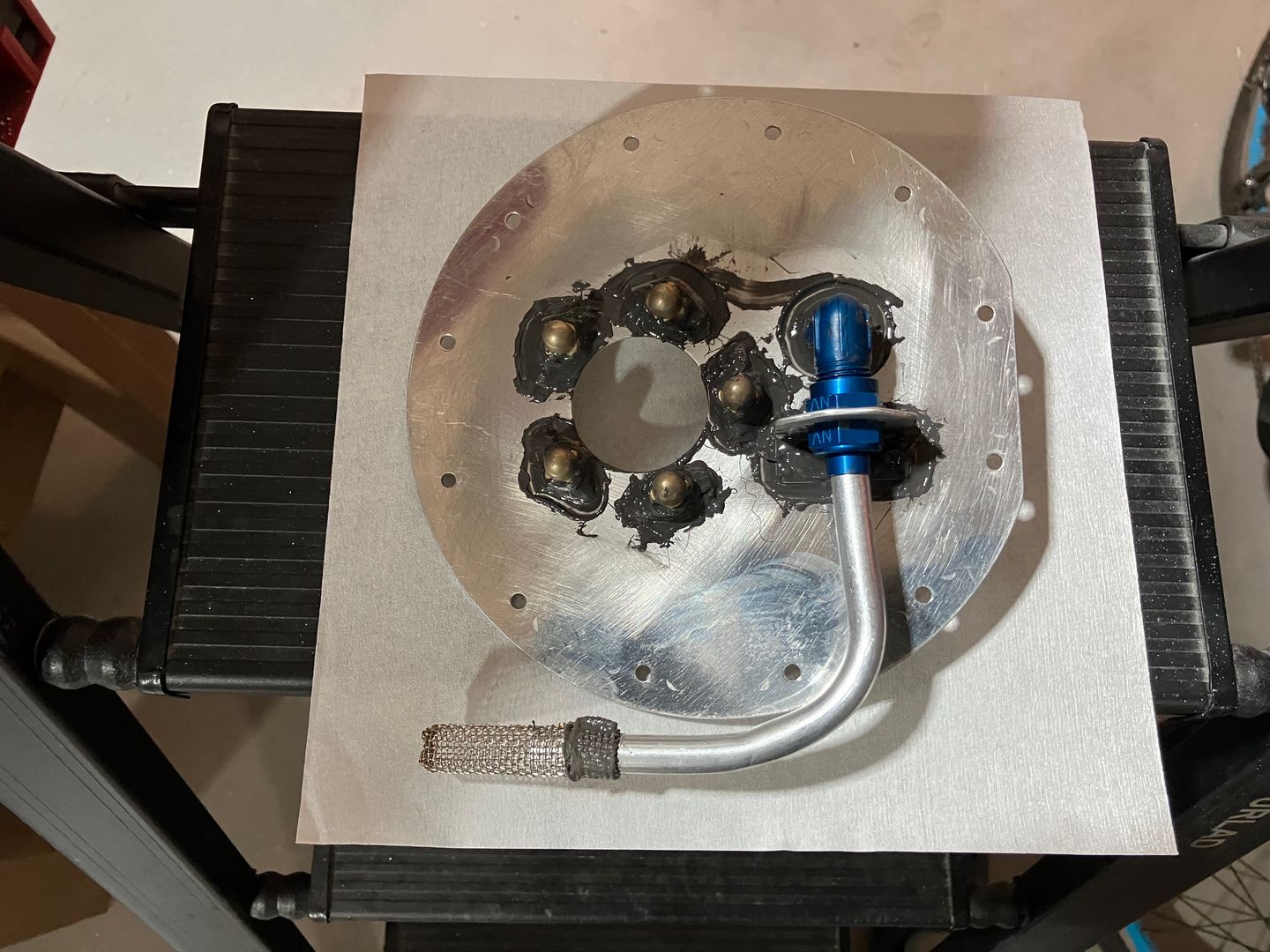 Fuel sender plate.