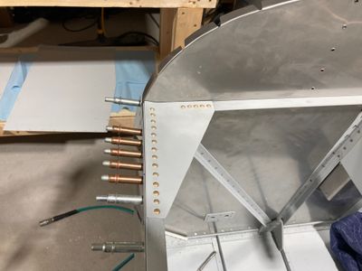 The F-695 gussets are riveted.