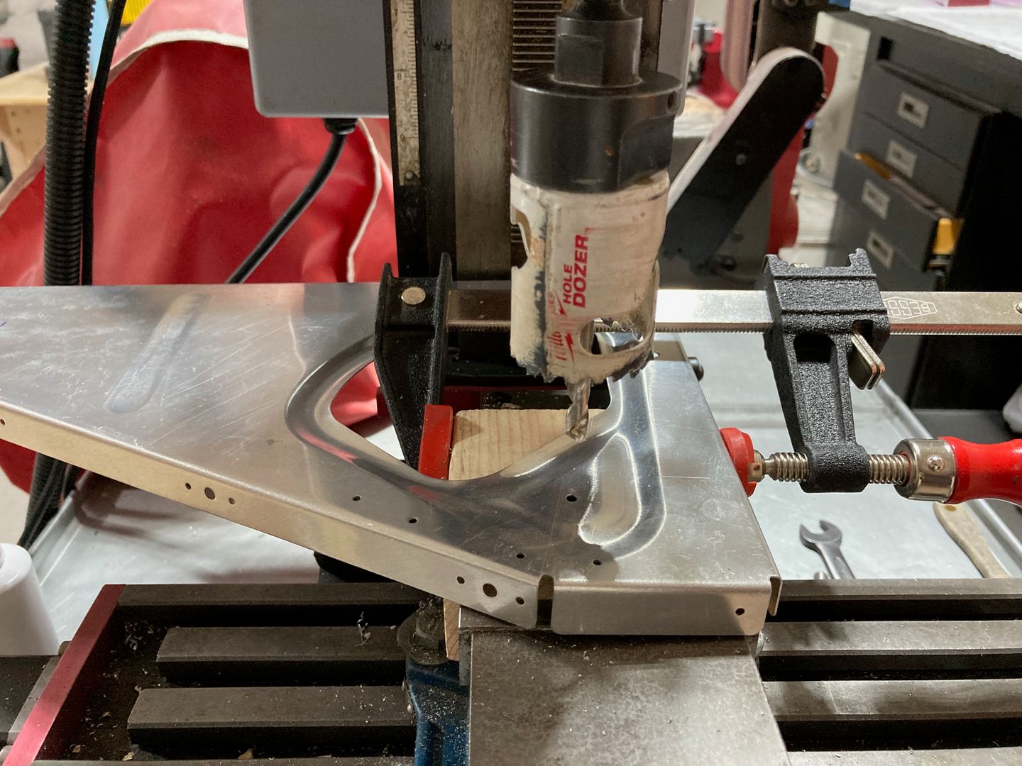 Using the hole saw to drill.
