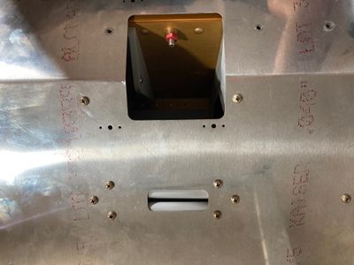 Installing the aileron trim and the crotch strap brackets