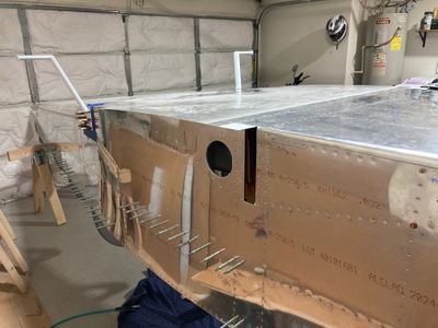 The last bulkhead rivets are done.