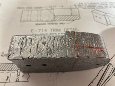 Marking the lines on the weight.