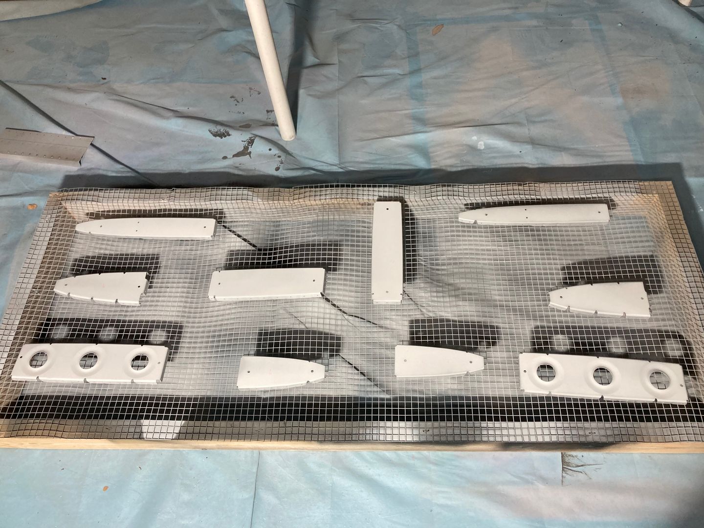 The parts are sprayed with the primer.