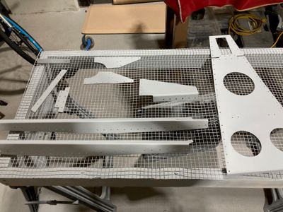 Priming the canopy decks and the aft deck