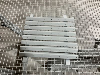 A single rack of stiffeners primed.