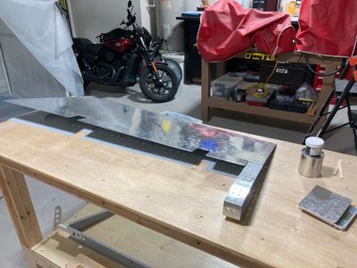 Getting ready to mix the tank sealant.