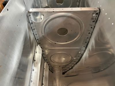 Third rib clecoed with the sealant.