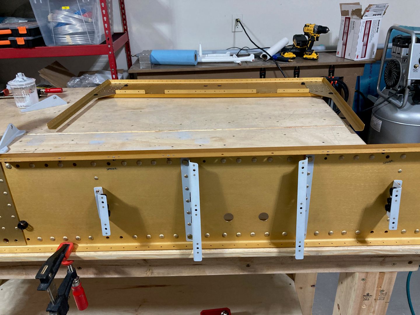 Riveted the cover support ribs.