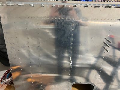 Riveting the bottom skins.
