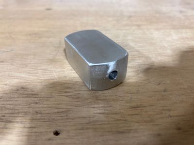 The machined spacer.