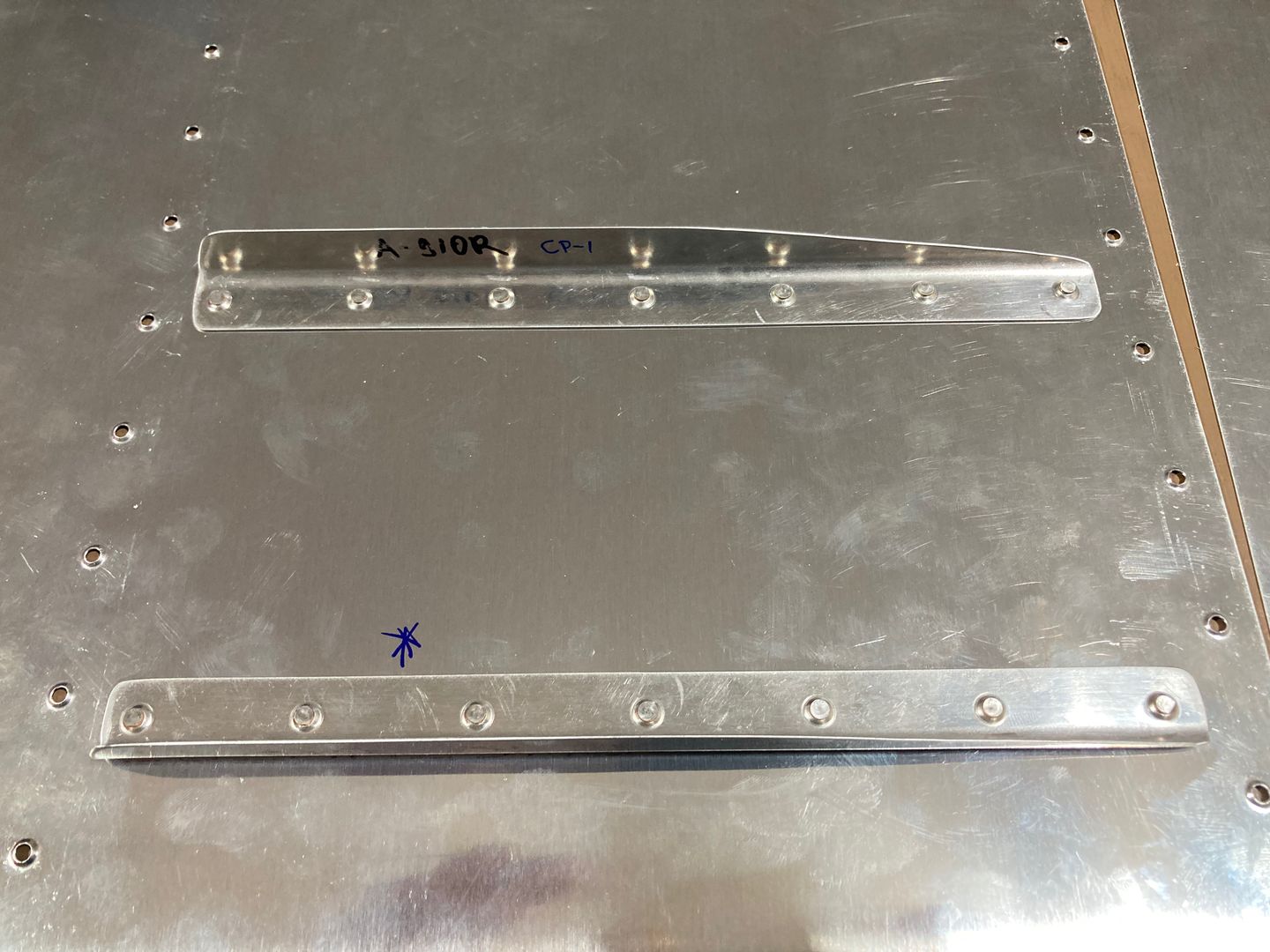 Stiffeners riveted to skins