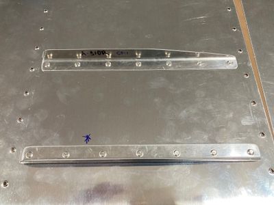 Stiffeners riveted to skins