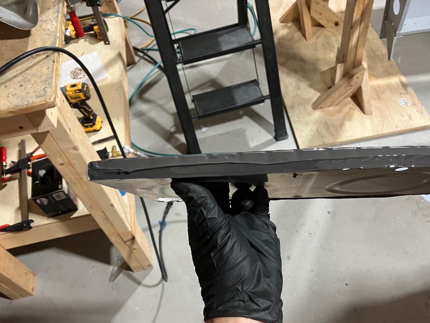 Tank sealant on the rib flange.