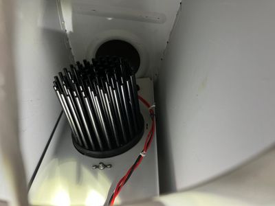 Routing wires behind the light.