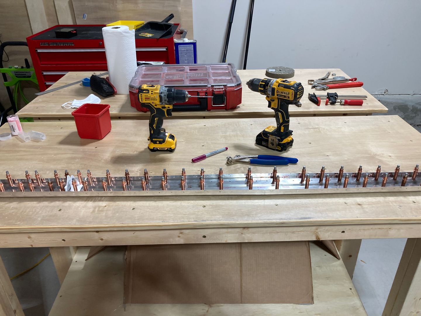 Drilling all of the holes for rear spar and both of the reinforcing bars.