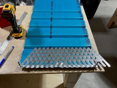 Using a rivet fan to drill the holes.