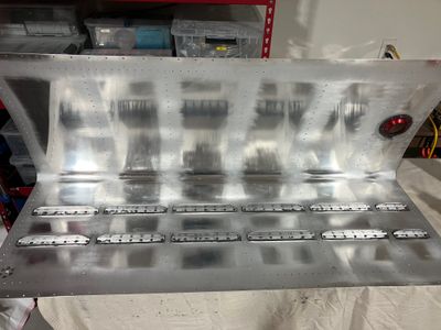 Riveting stiffeners to the fuel tank skin