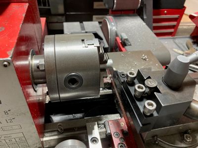 Using the lathe to make the bushings.