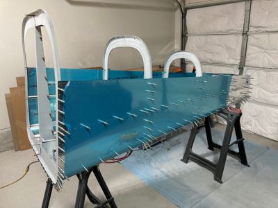 The aft fuselage is back on the sawhorses!