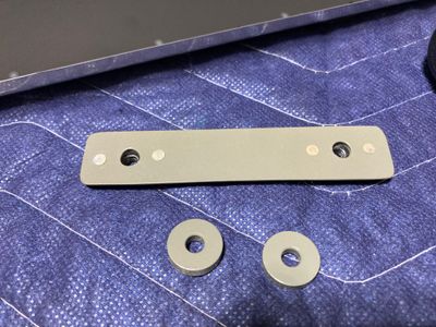 The new nutplate strip and the bushings.