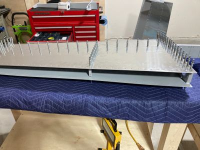 Front spar assembly is inserted into the skin.