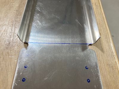 Flanges shortened and relief notches created.