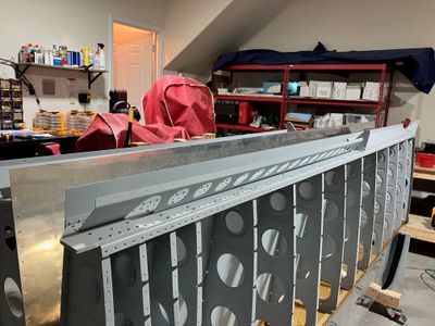 Brace and fairing are riveted.
