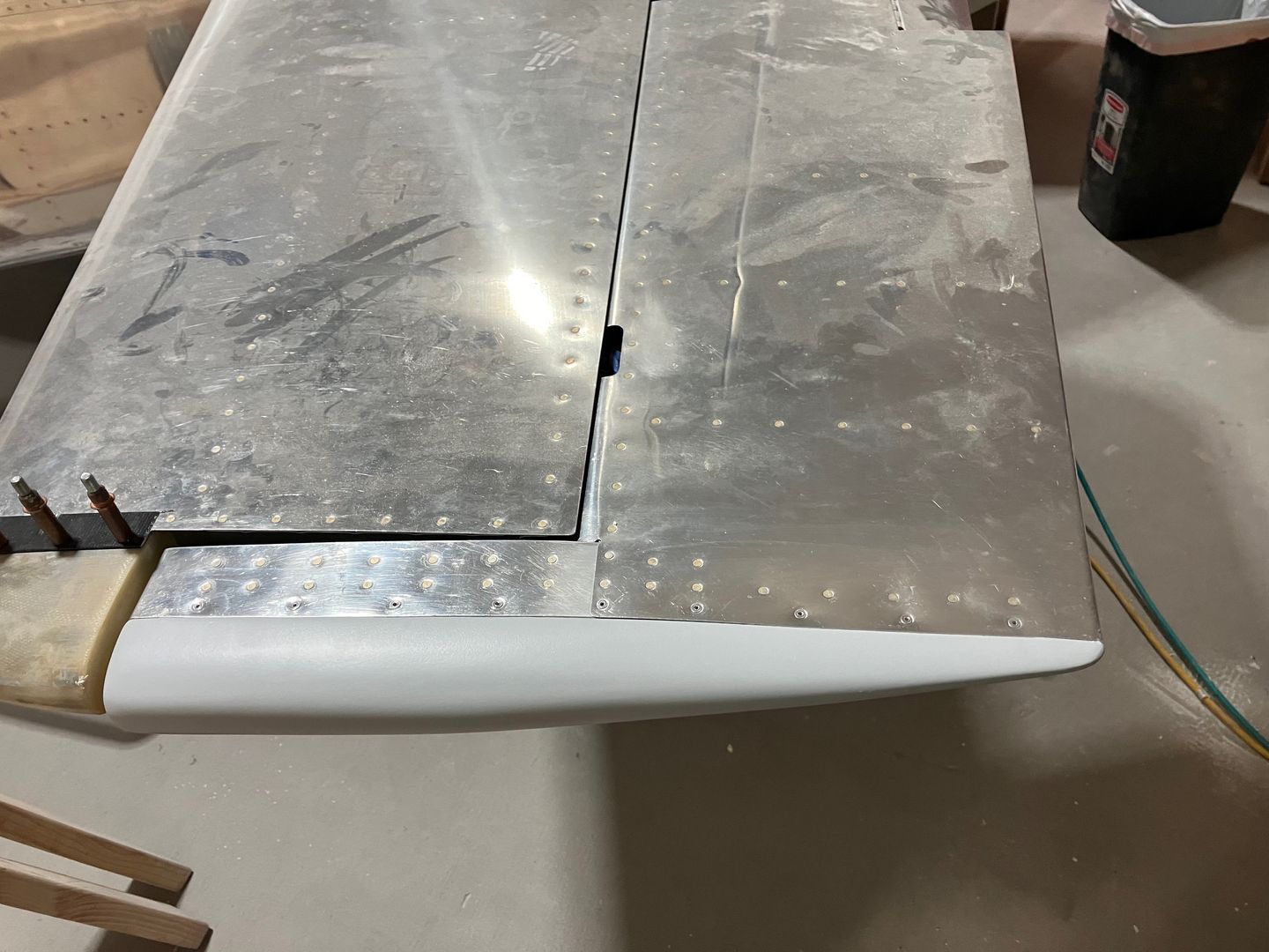 Elevator fairings riveted