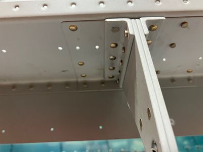 Riveting the aileron brackets