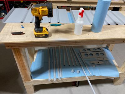 The seat backs and push rods are primed!