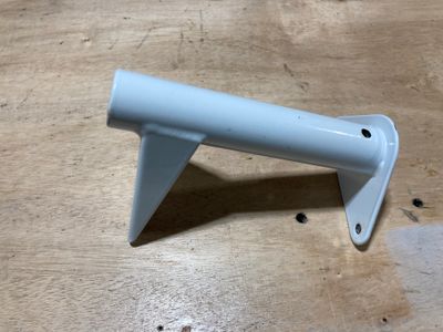 The powder coated bracket.