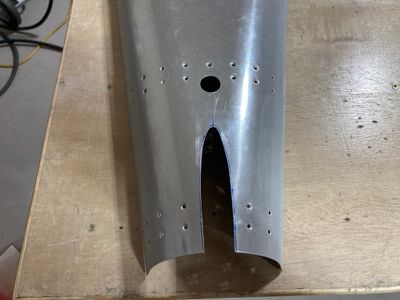 A relief hole is cut.
